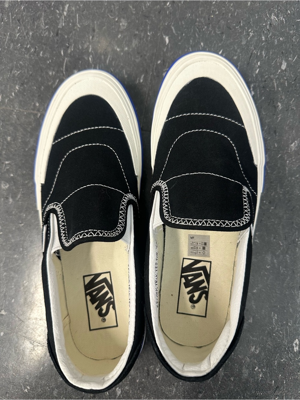 Vans Black & White Slip-On Canvas Sneakers